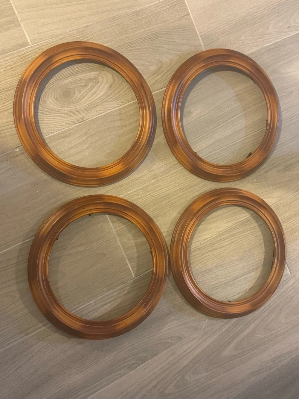 One set of 4 Round wall plate frames